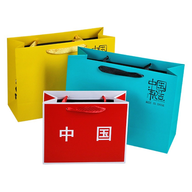 Gift Paper Bag Hand Bag White Cardboard Color Printing Made in China Personalized Simple Shopping Hand Bag In Stock