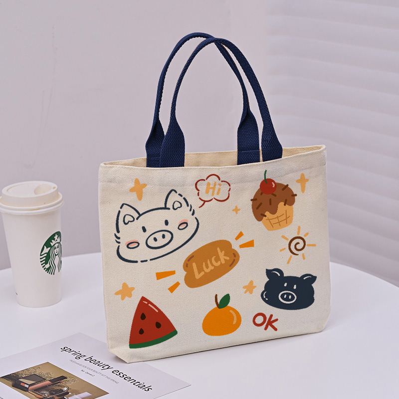 Picture of 2025 New Cute Cartoon Japanese Style Canvas Bag Tutorial Lunch Bag Manufacturer Wholesale Bag Women's Bag Handbag