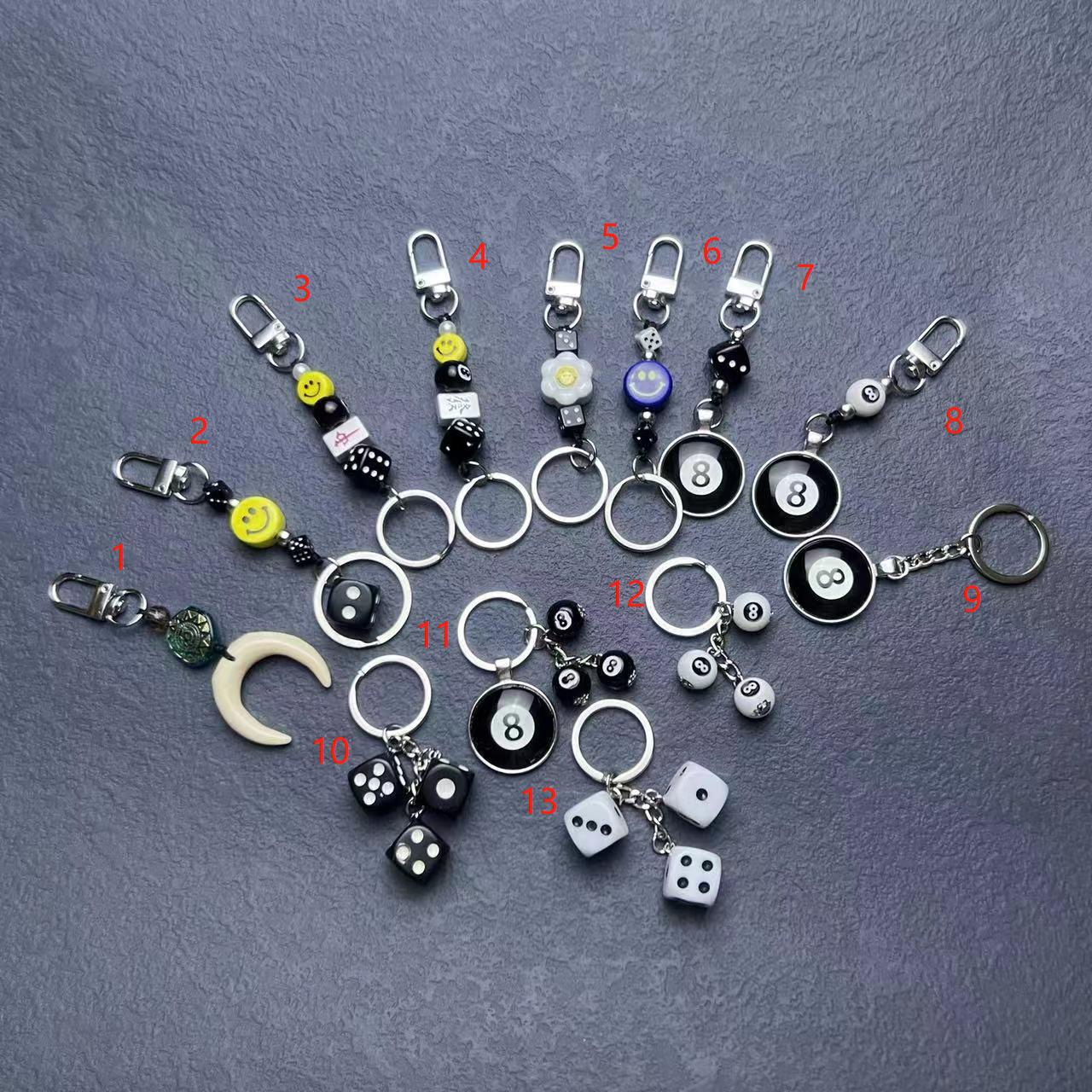 Foreign trade in stock hot selling smiley face keychain bag buckle dice digital cross-border personalized key pendant jewelry wholesale