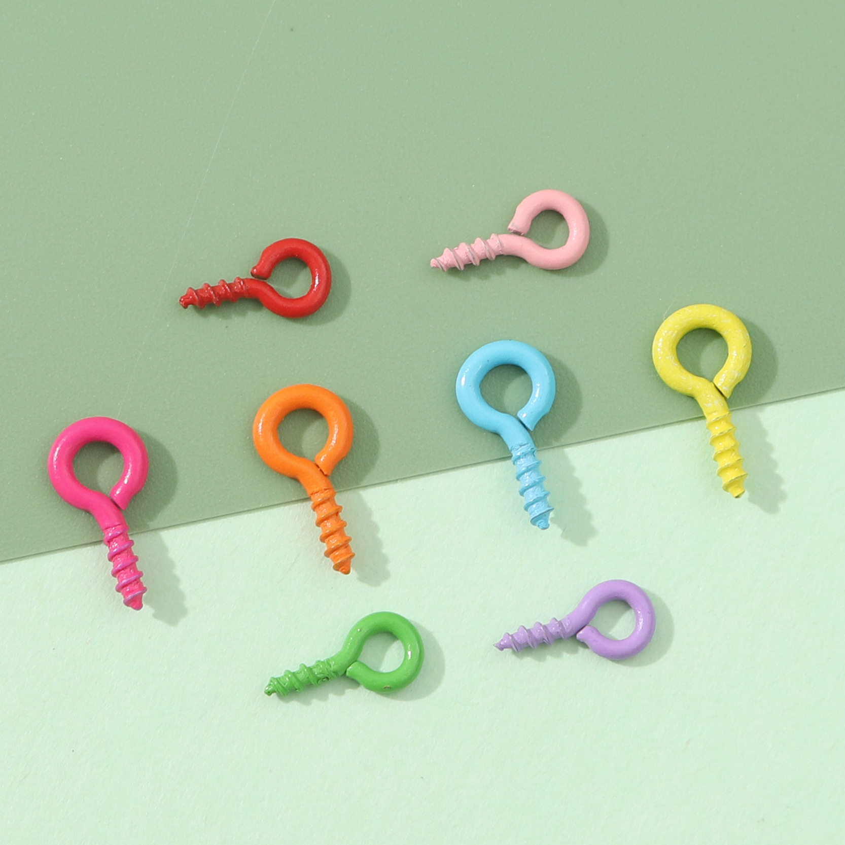 Picture of Handmade DIY jewelry accessories 100 pice color spray paint sheep angle nail screw jewelry material wholesale sheep eye nail