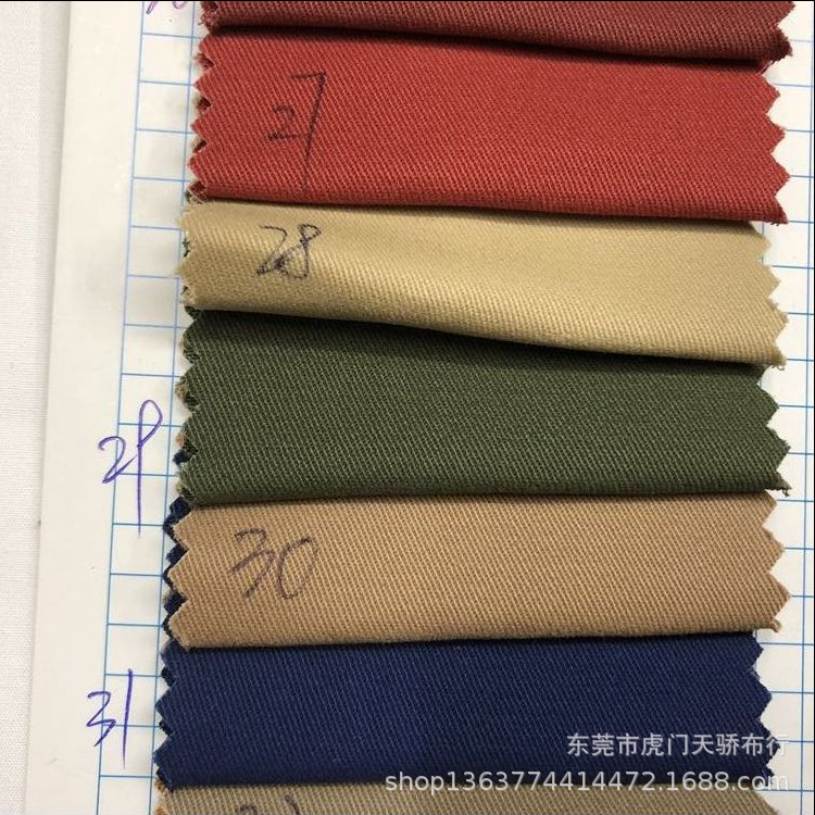 Spot supply woven stretch yarn card cotton cloth 32 carbon grinding high density oblique twill stretch casual clothing fabric