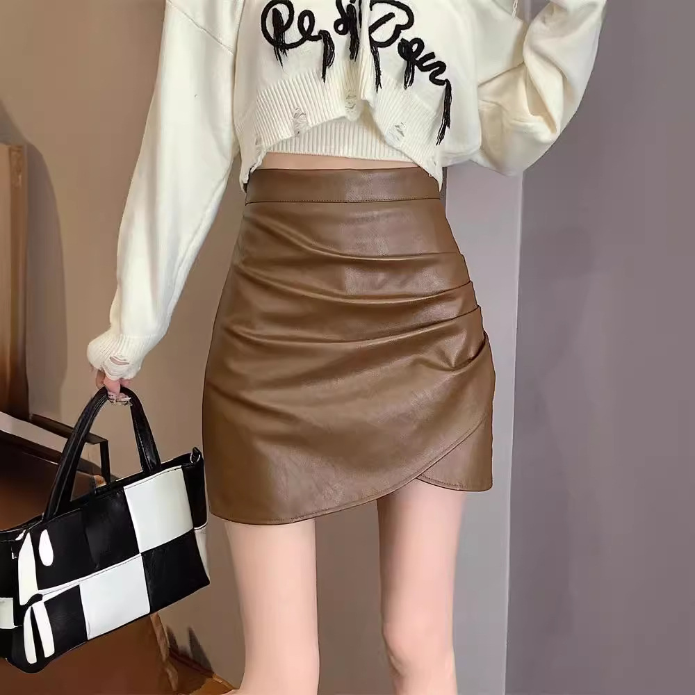 2025 new autumn and winter black PU leather skirt women's plus size chubby girl high waist A- line hip pleated short skirt