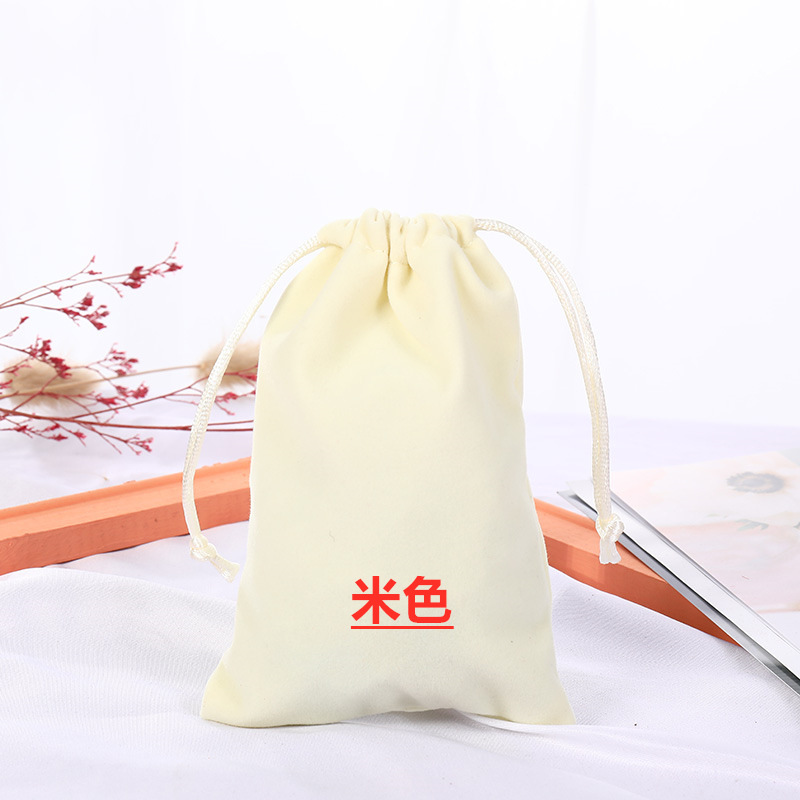 Picture of Boutique bunched flannel bag first jewelry seal text play packaging bag printed electronic products hand string gift storage bag