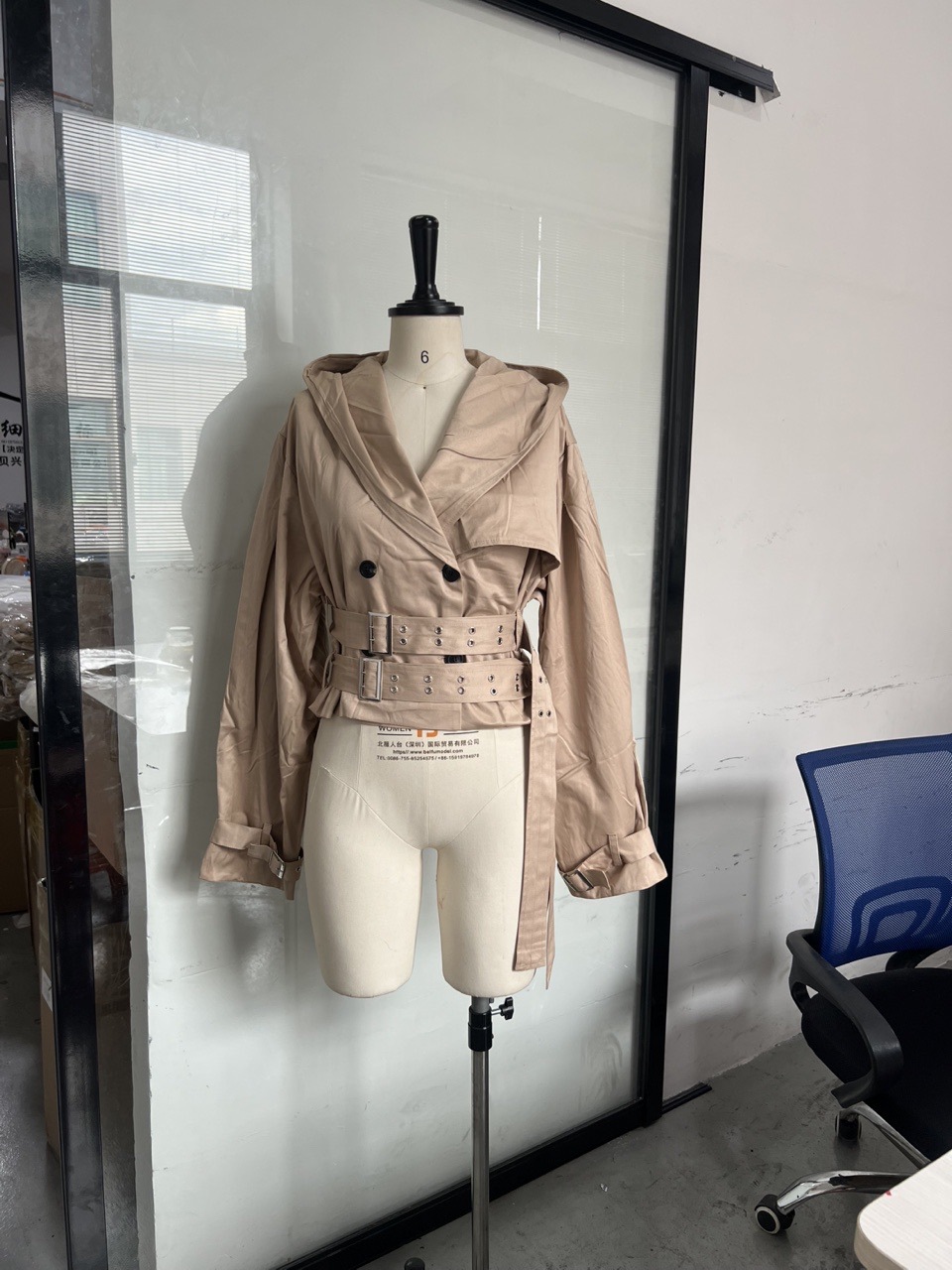Picture of Cross-border European and American fashion versatile style 2025 new mid-length trench coat women's hooded double belt short jacket to look slimmer