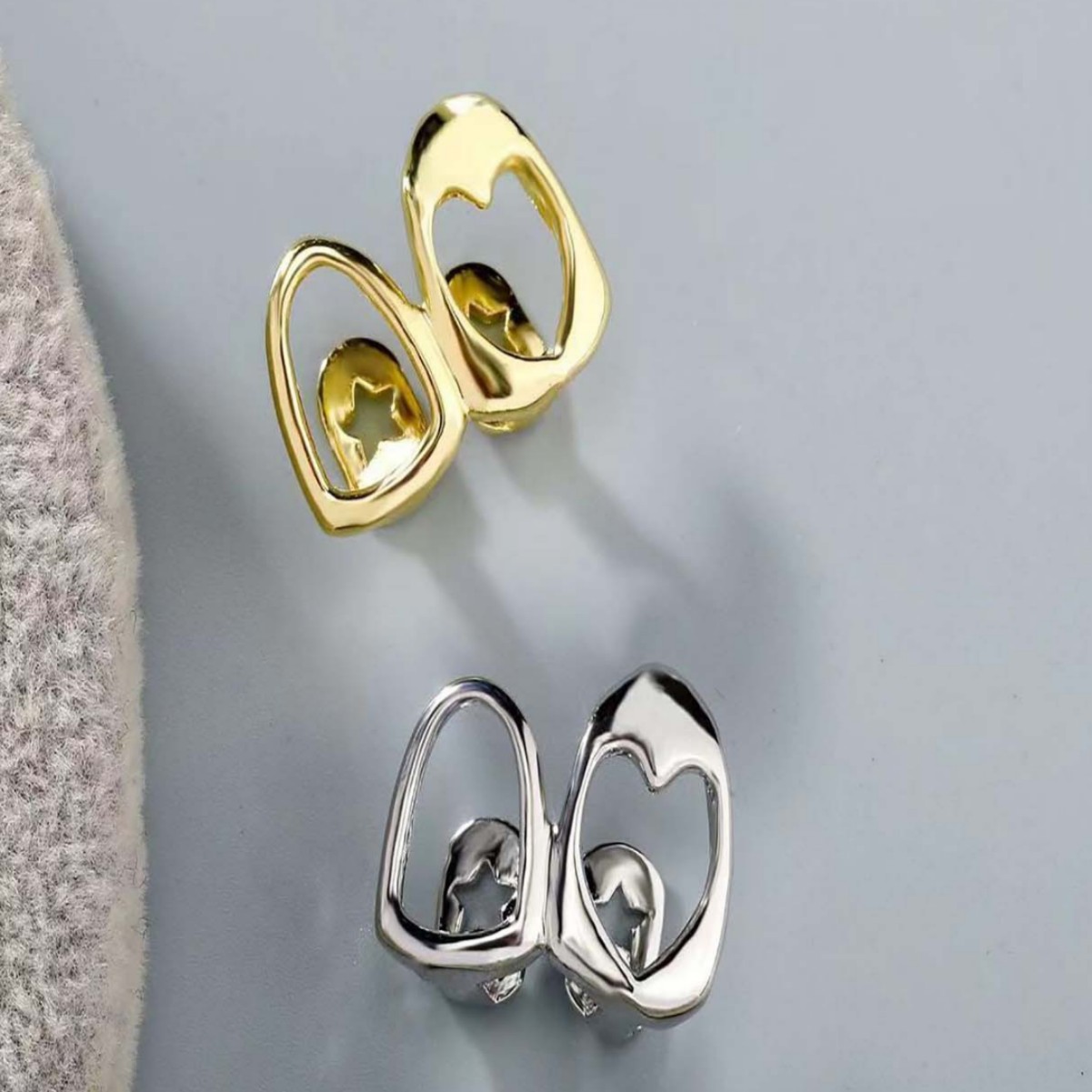 Aoxiang hollow love double braces daily out of the street cool smooth gold teeth hip-hop Joker cross-border accessories wholesale