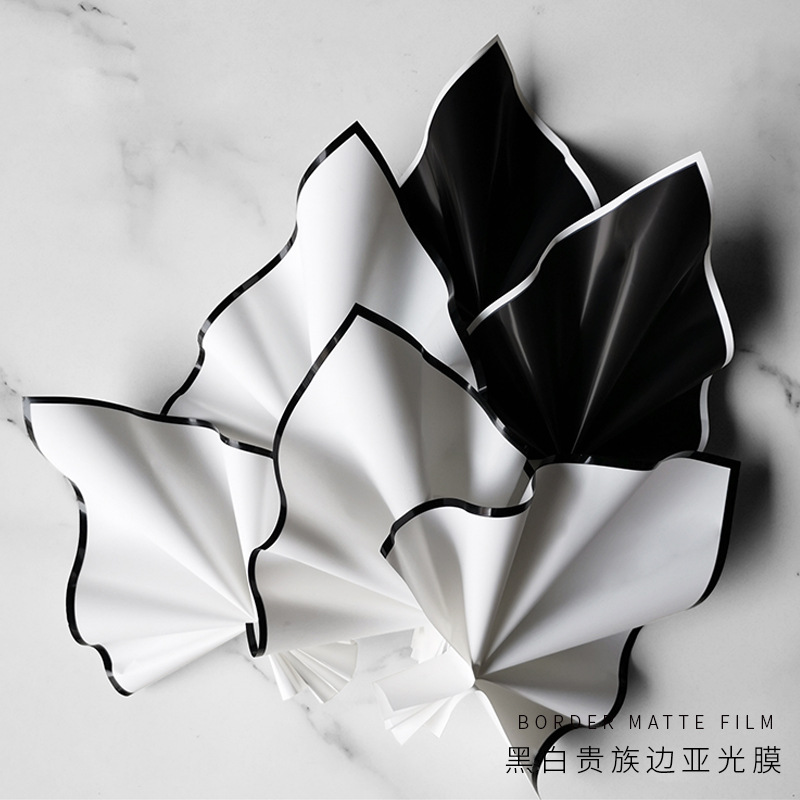 Huaxi Qingming festival bouquet packaging black and white Noble edge matte film flower packaging waterproof chrysanthemum bouquet packaging