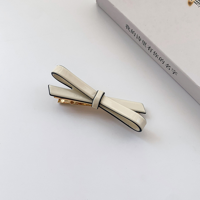 Picture of French Classic Bow Hairpin Acetic Acid Fresh Girl's Side Bangs Clip Cross Hollow Bow Tie Hairpin