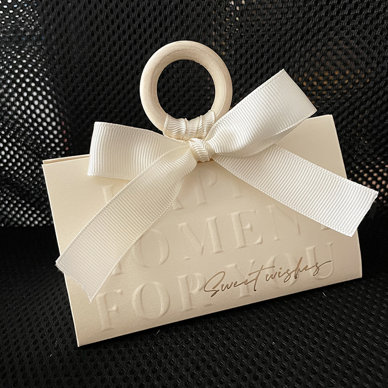 Picture of Light luxury champagne hand-held triangle wedding candy box wooden ring hand gift box wedding candy box wholesale