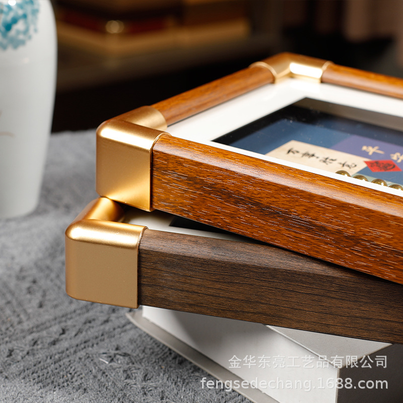 Picture of Solid wood hollow imitation copper corner photo frame texture wooden table wholesale high-end desktop ornaments picture frame manufacturers wholesale