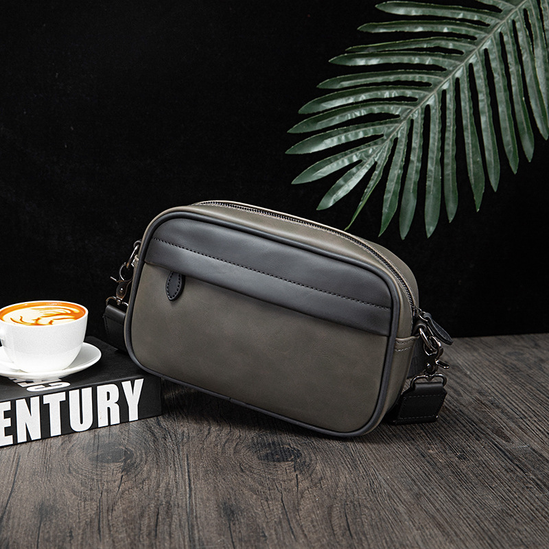 Picture of Korean fashion Men's messenger bag 2024 New retro solid color small backpack casual shoulder phone bag for men