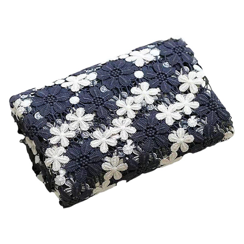Autumn and winter new milk silk small plum blossom embroidery fabric Black and White Hollow two-color water soluble embroidery cloth spot wholesale