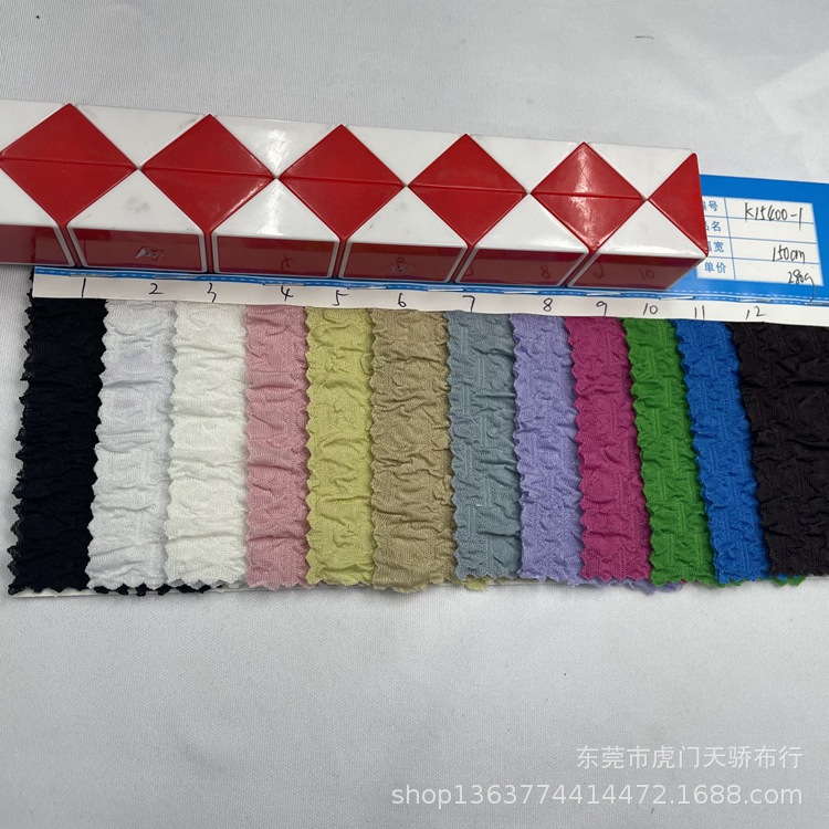 Spot knitted bubble cloth jacquard 280g vertical bubble wrinkle jacquard money copper copper money clothing fabric
