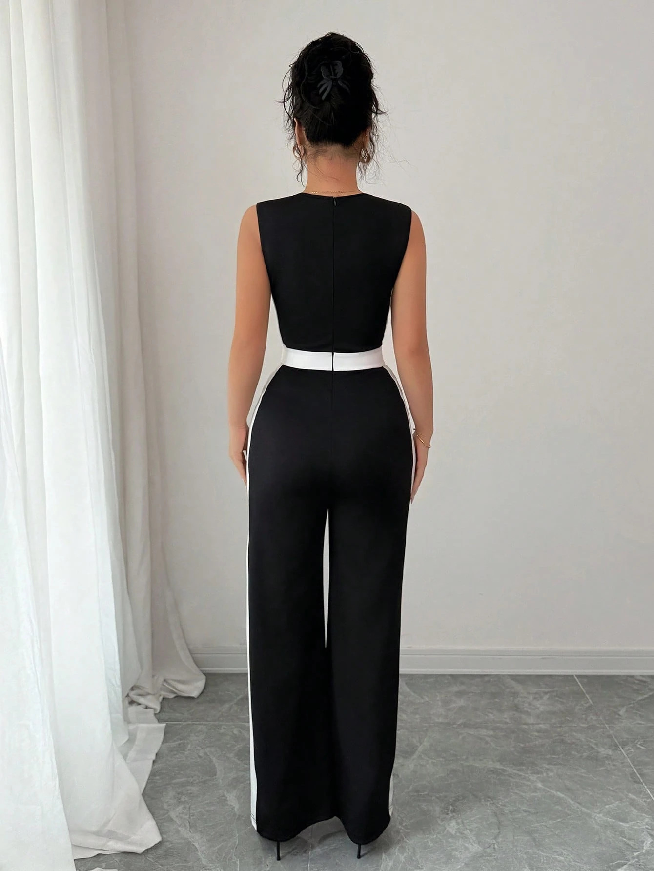 Picture of Cross-border European and American clothing 2025 women's spring and summer vacation style European and American temperament color-blocking sleeveless wide-leg jumpsuit