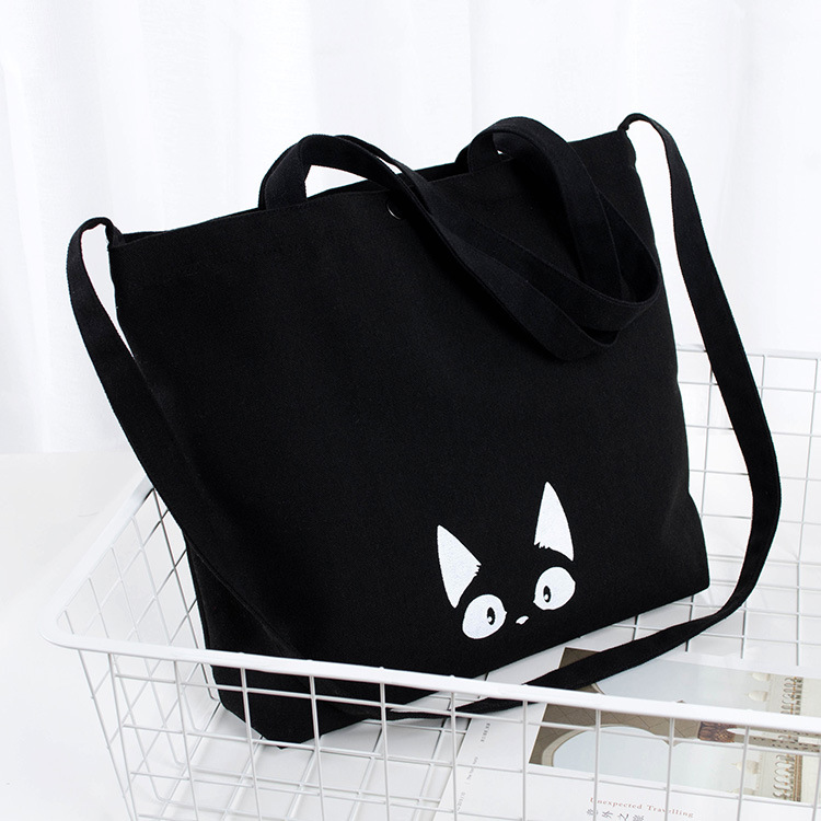 Factory wholesale in stock cartoon portable shopping shoulder bag simple snap cotton black crossbody canvas bag