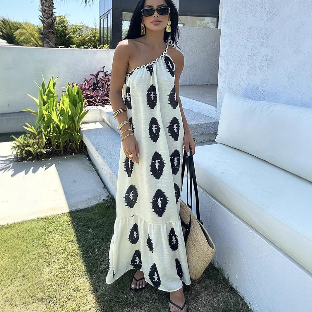 Cross-border foreign trade European and American style dress 2025 summer new French design sense single-piece strap beach skirt women's skirt