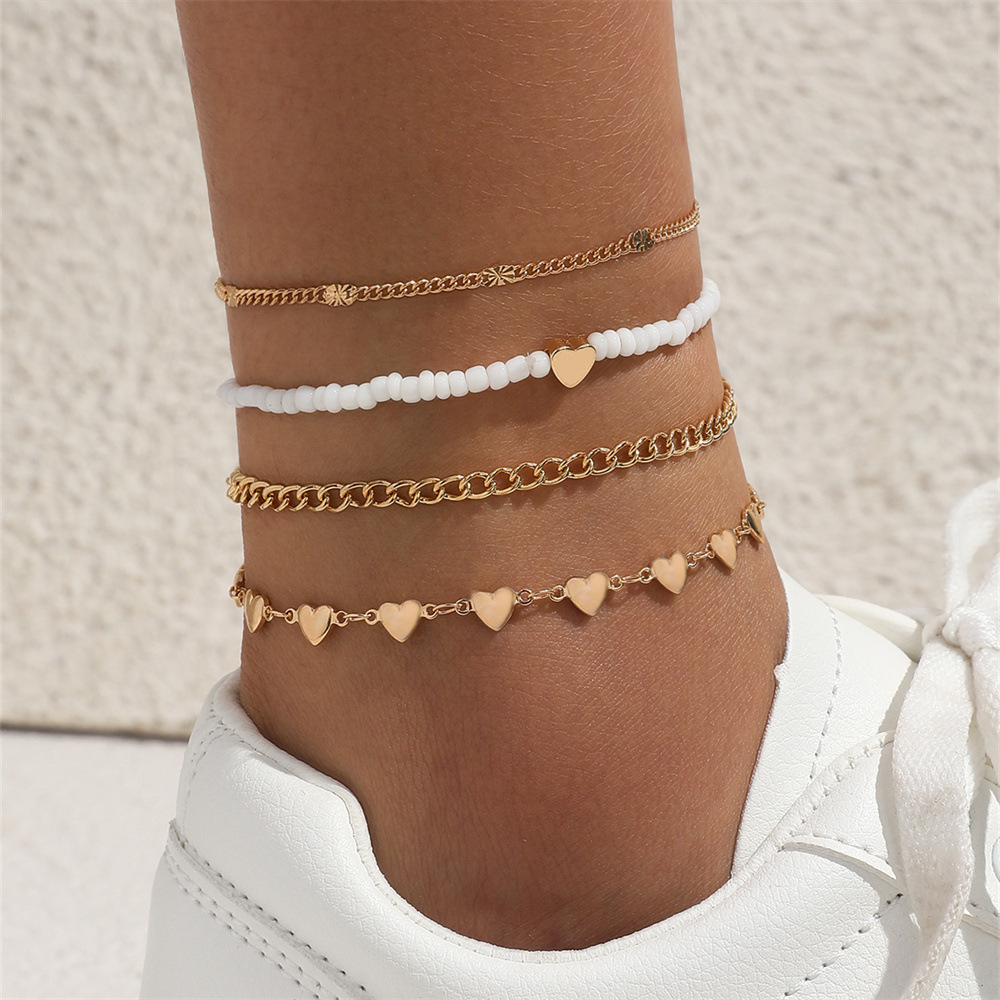 European and American multi-layer anklet cross-border new retro beach metal chain heart-shaped rice beads anklet suit 4-piece set