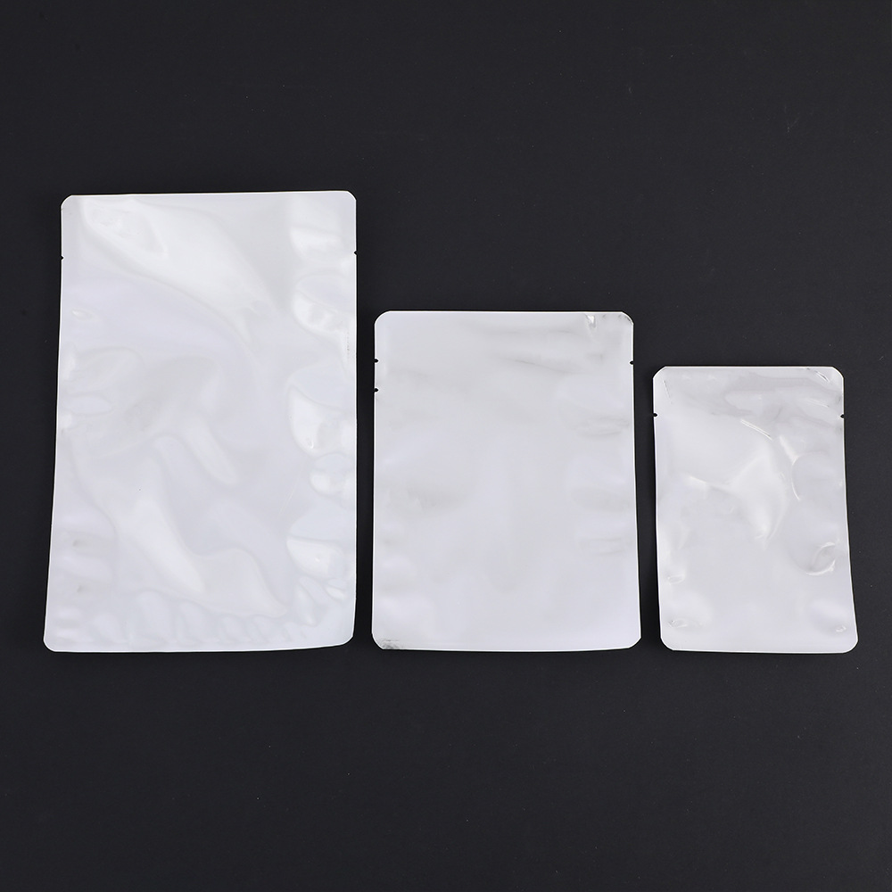 Picture of Spot Aluminized Toy Blind Bag Packaging Bag Three-Side Sealing Vacuum Bag Turtle Pair Touch Plastic Sealing Bag Aluminum Film Bag