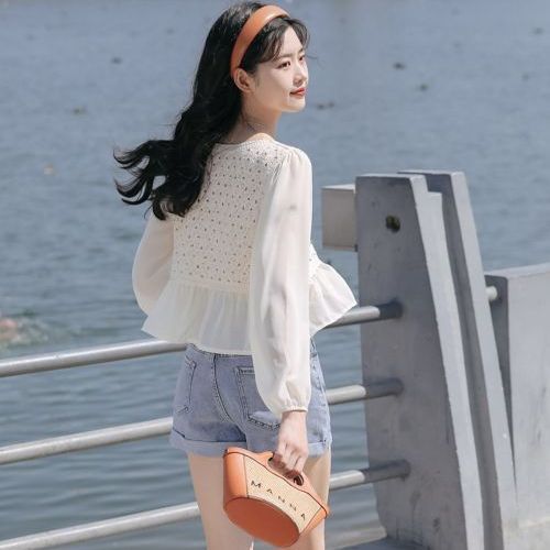 Picture of French Design Sense Striped Crochet Hollow Shirt Autumn New Niche Knitted All-match Puff Sleeve Top Trendy Version