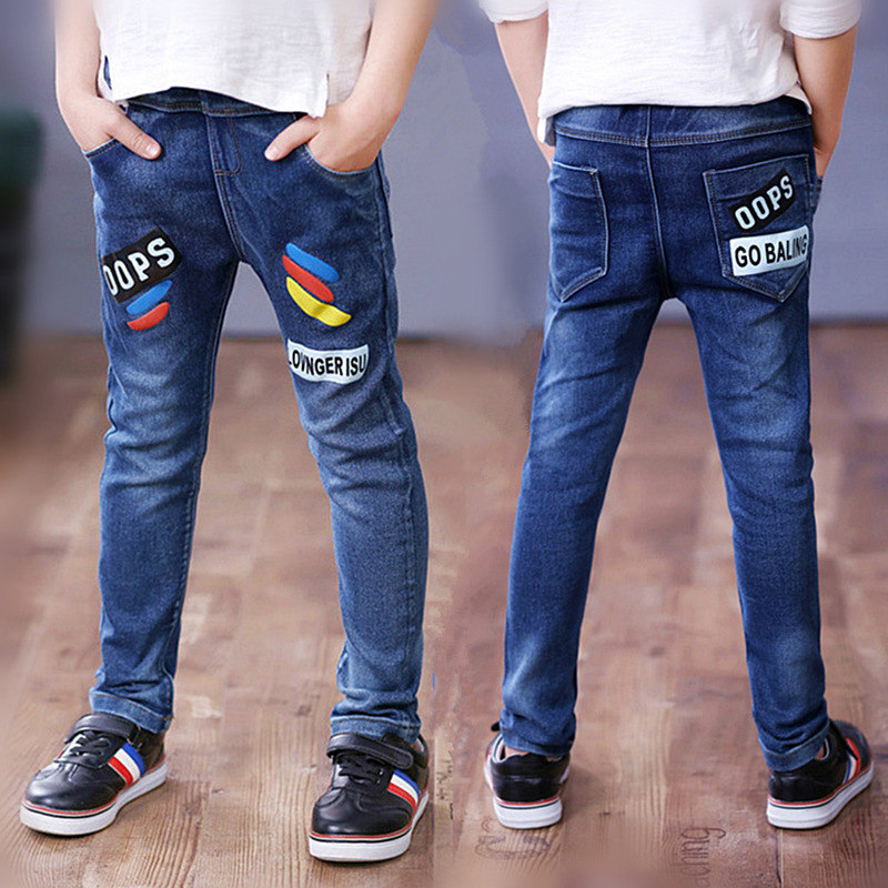 Children's jeans boys pants spring and autumn children's clothing front and back real pockets in the big children's washed pants manufacturers wholesale