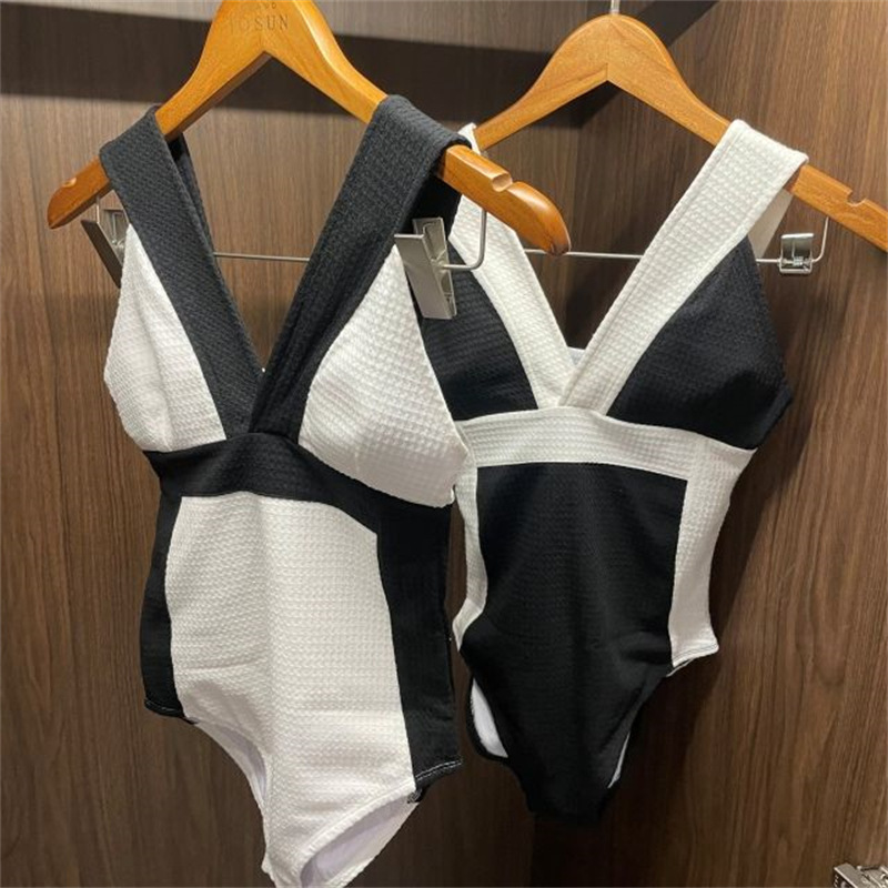 Cross-border swimsuit 2022 new bikini Korean style sexy black and white backless slim strap one-piece swimsuit for women Wholesale