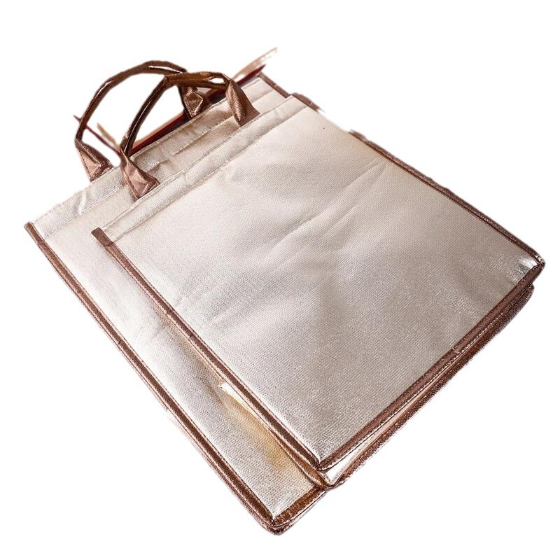 Picture of 6-inch 8-inch cake insulation bag in stock non-woven laser aluminum film insulation bag takeaway ice bag can be printed logo