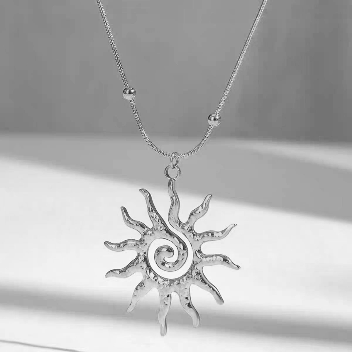 Picture of Cross-Border New Sun Pendant Titanium Steel Necklace Earrings Ring Women's Design Light Luxury Niche High-End Jewelry Set