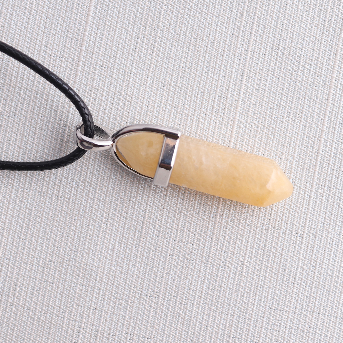 Picture of Natural Stone Hexagonal Pendant European and American Natural Crystal Hexagonal Prism Bullet Hexahedral Black Wax Rope Necklace