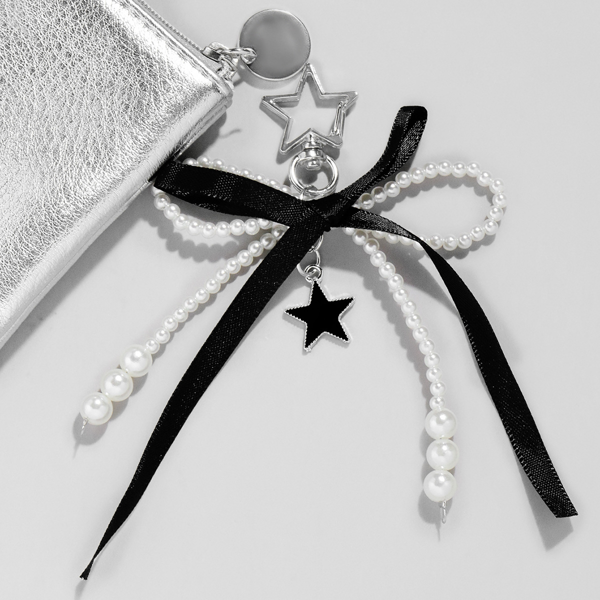 Cross-border explosions sweet cool fashion imitation pearl black ribbon bow oil stars keychain bag pendant