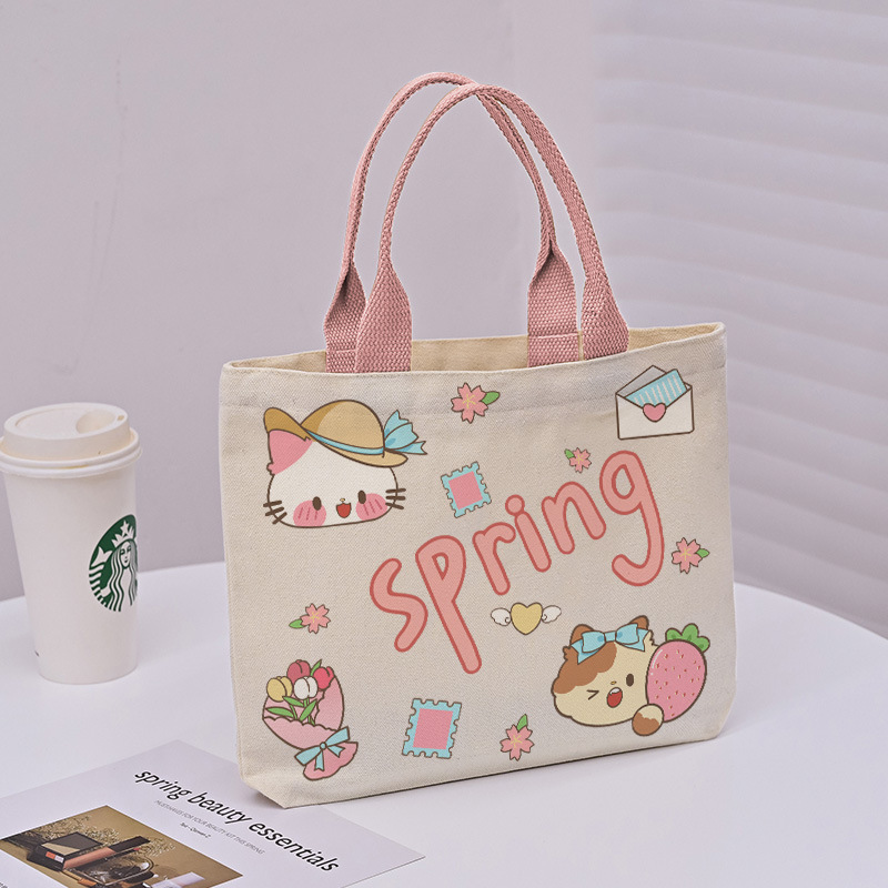 Picture of 2025 New Cute Cartoon Japanese Style Canvas Bag Tutorial Lunch Bag Manufacturer Wholesale Bag Women's Bag Handbag