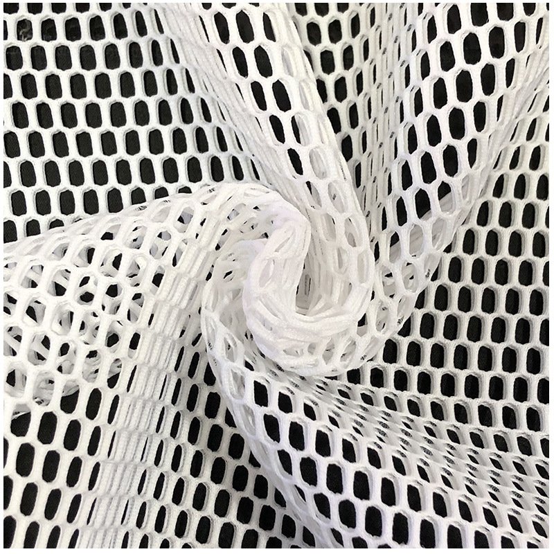 In stock warp knitted polyester large hole mesh cloth double-sided transparent mesh cloth mesh bag clothing large hole hexagonal mesh cloth