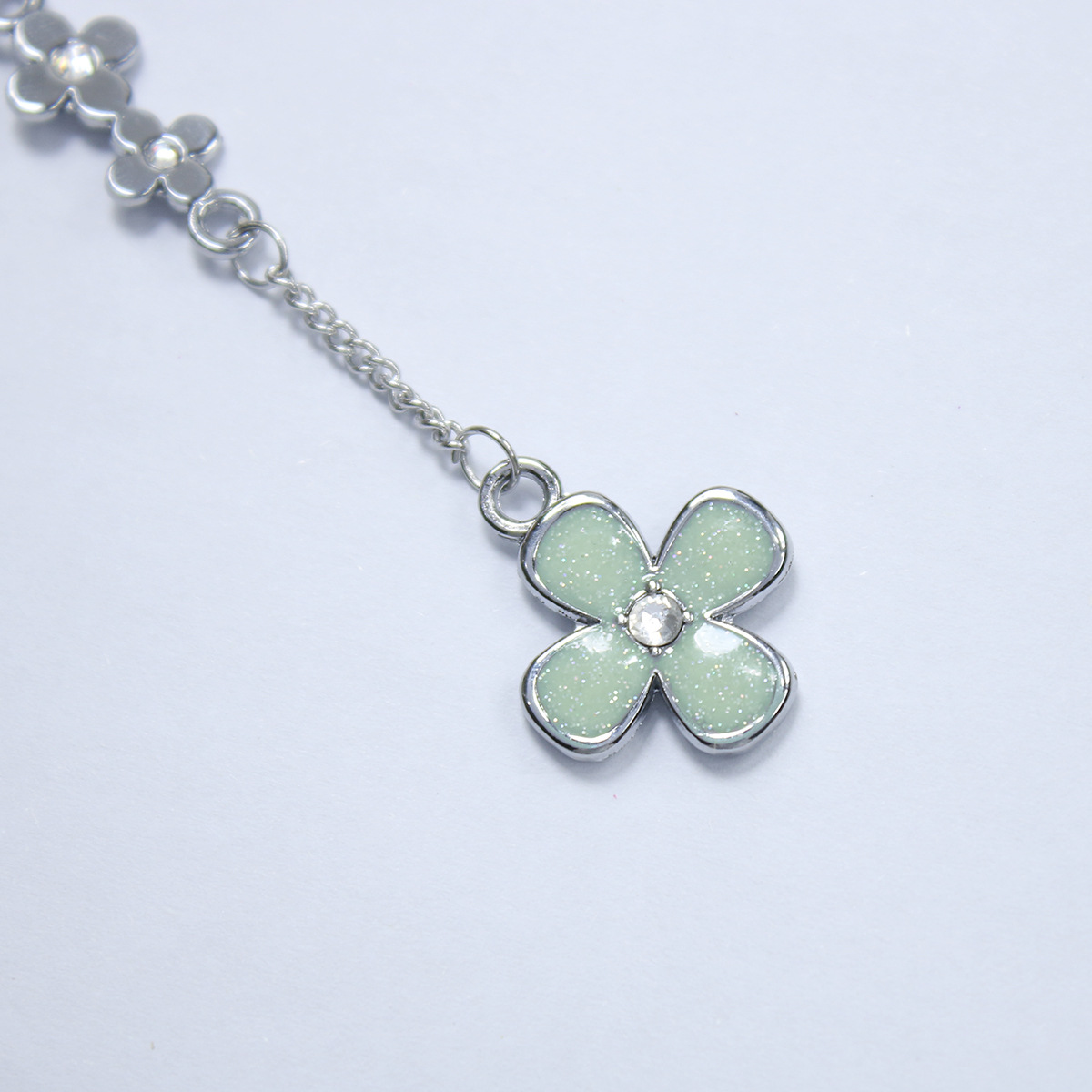 Picture of I really want to tell you about the surrounding mobile phone chain wind early delivery black boshuang Zi's four-leaf clover mobile phone chain bag pendant gift