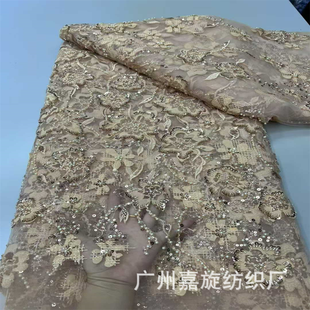 Picture of 2025 New Laser Floral Mesh Yarn Bead Tube Embroidery 3D Applique Pearl Sequin Embroidery Fashion Lace Fabric Beaded