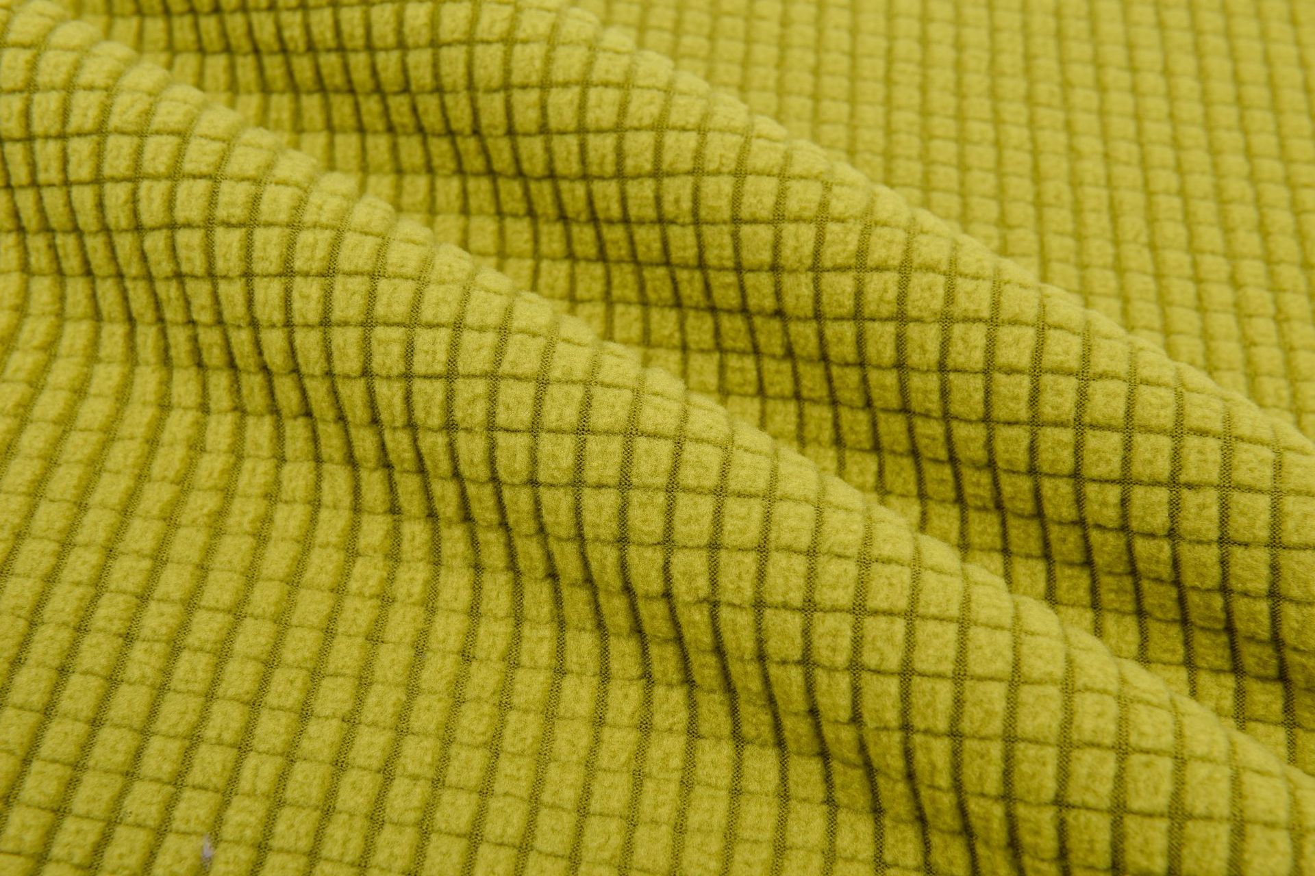 Picture of in stock pineapple plaid fleece sofa cover fabric wholesale waffle corn grain plaid jacquard flannel fabric
