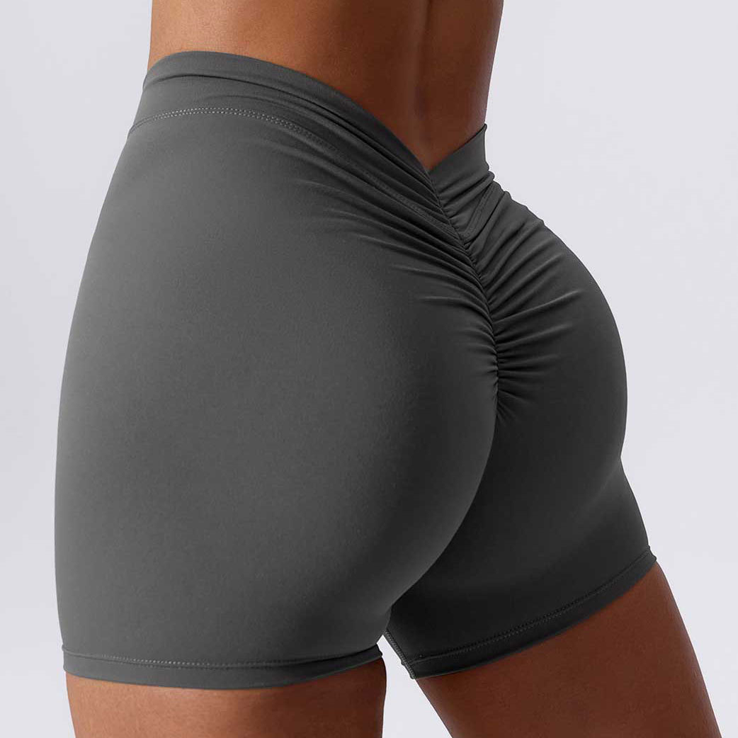 Solid color waist back V wrinkle hip lifting nude three-point pants high elastic yoga pants breathable quick-drying fitness shorts for women