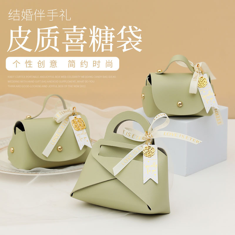 Picture of European Creative Wedding Candy Box Leather Ins Style Satchel Wedding Candy Bag Wedding Souvenir Gift Candy Gift Box
