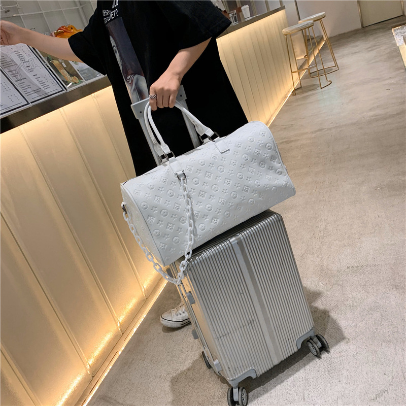 Picture of 2023 New Short Distance Travel Bag Large Capacity pu Portable Travel Luggage Bag Fashion Embossed Sports Fitness Bag
