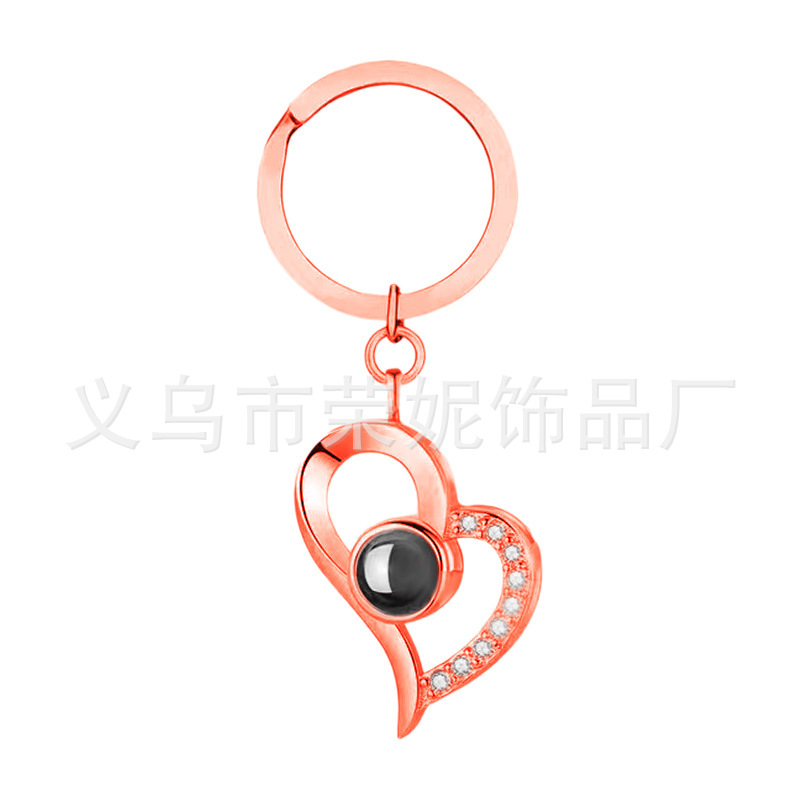 Picture of Tiktok same style hot sale S925 silver necklace 100 languages pendant keychain I love you projection not fade female