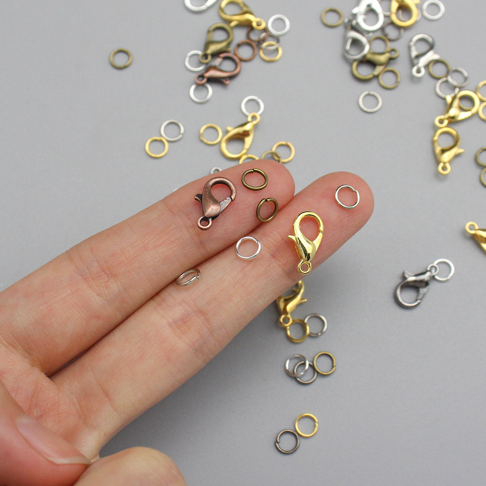 Picture of Cross border hot sale wholesale 6 color metal lobster clasp iron ring jewelry small accessories boxed DIY bracelet necklace accessories