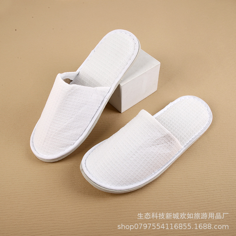 Picture of Hotel and homestay disposable waffle slippers home hospitality travel thickened slippers can be wholesale ordered LOGO