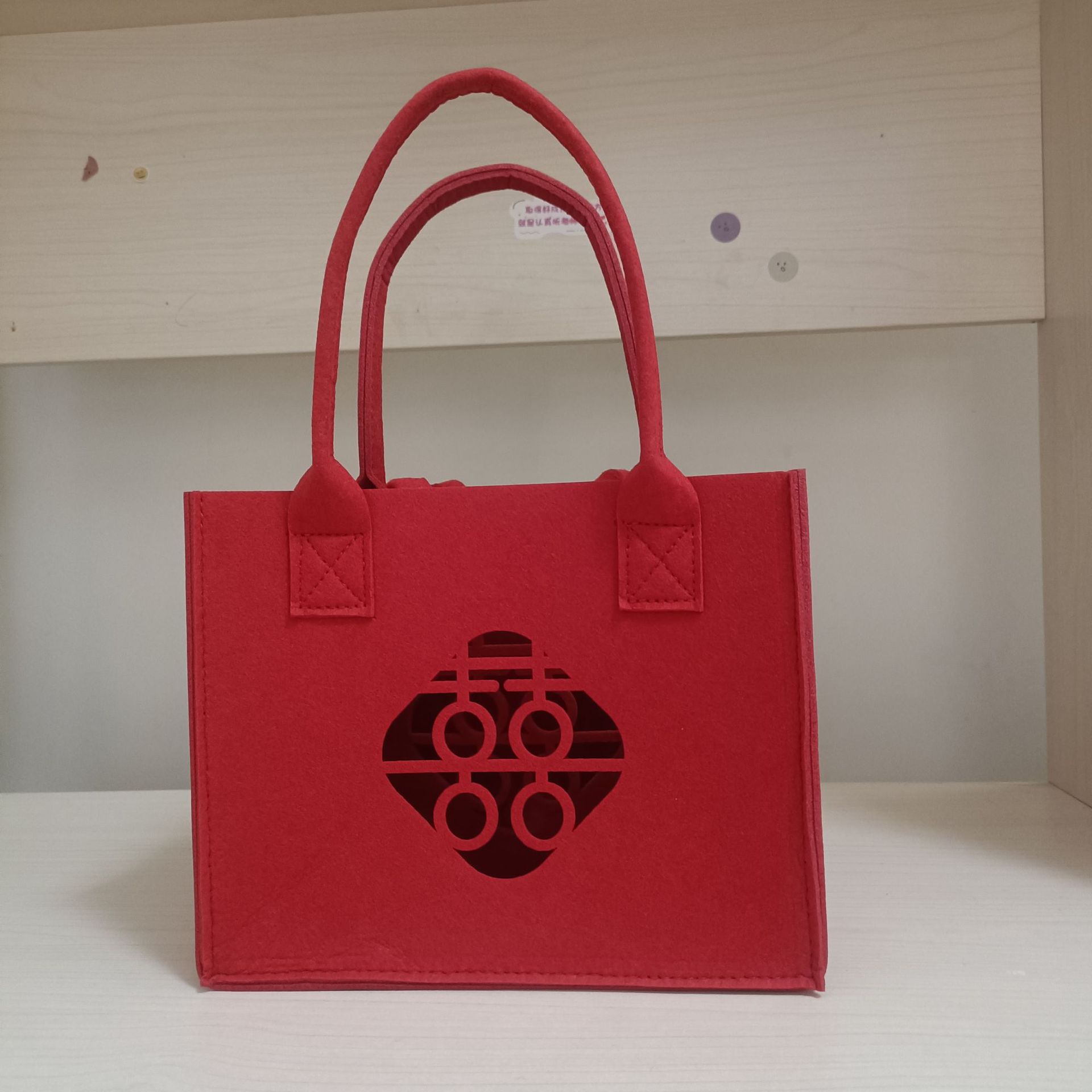 Picture of Wedding banquet happy word felt bag hollow happy word felt handbag wedding happy word lucky word hand gift lucky word felt bag