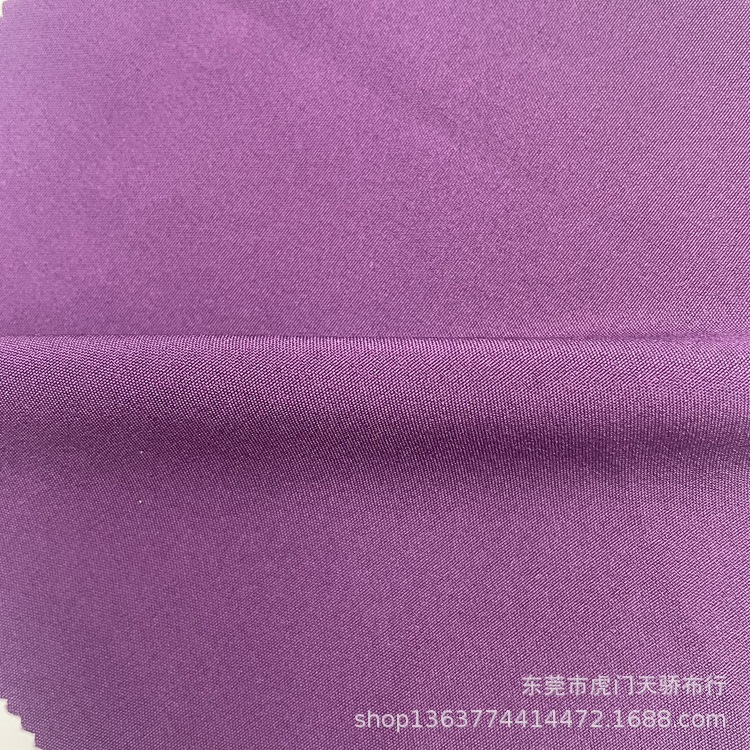 In stock woven fashion polyester fabric thickened 100D four-sided stretch 125g dress shirt top fabric