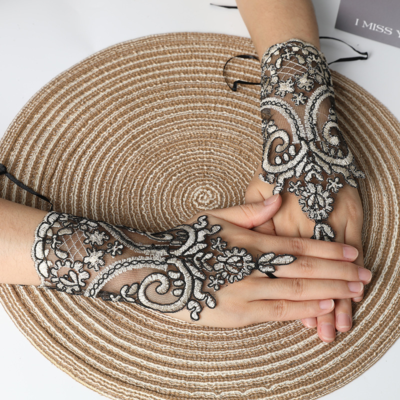 Picture of Hook-Finger Short Mesh Lace Bow Sleeves European and American Bride Wedding Dress Hand Sleeves Short Lace Gloves Wholesale