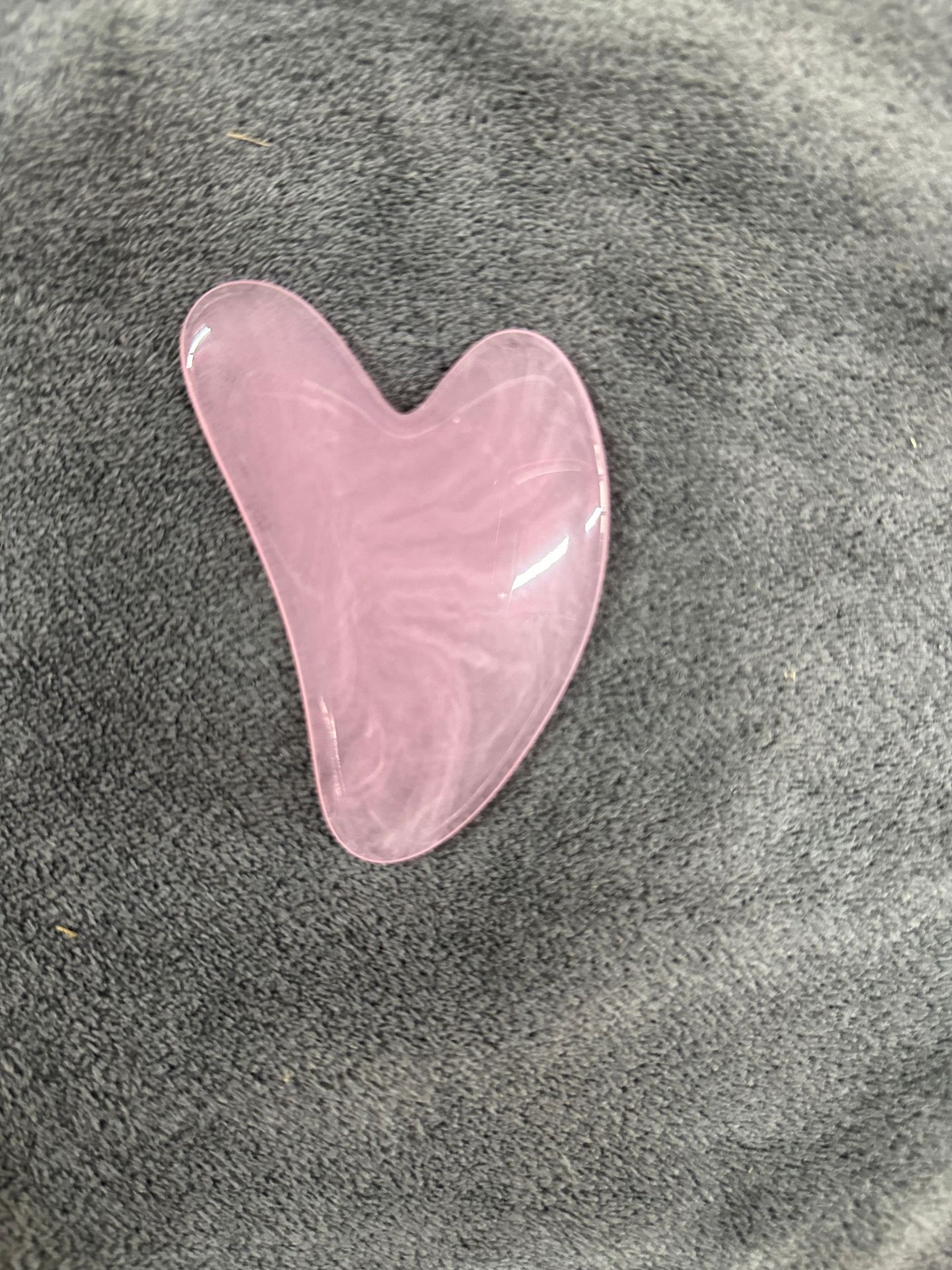 Picture of Manufacturer's Wholesale Resin Heart-Shaped Gua Sha Tools for Massaging the Back, Neck, Waist, and Full Body Meridians, Made of Natural Materials