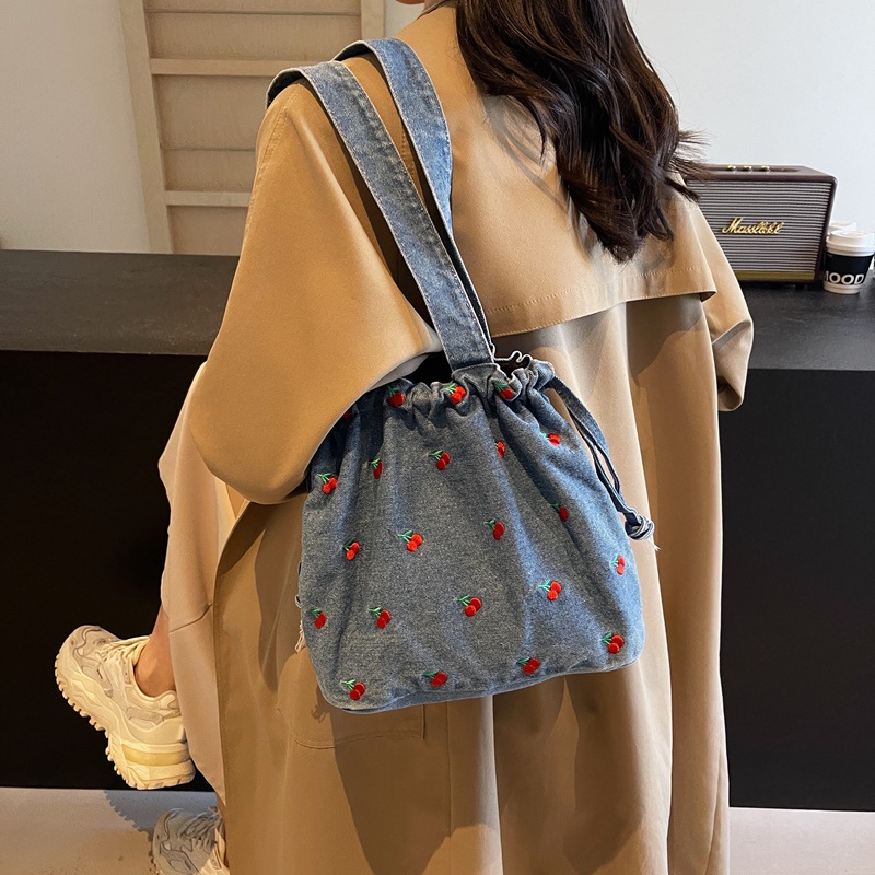 Picture of Foreign Order 2025 New Denim Bucket Bag Large Capacity Women's Bag Niche Design Shoulder Bag High-End Armpit Bag Trendy