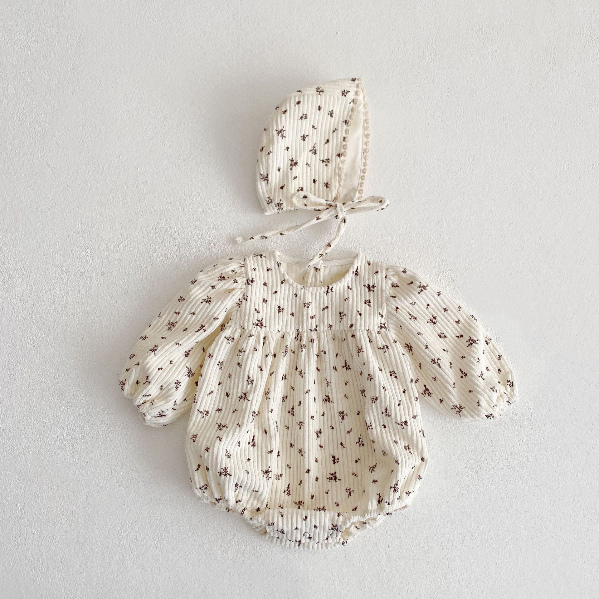 Picture of 2023 Spring and Autumn Baby Girl Corduroy Bubble Small Floral Long-Sleeved Triangle Climbing Suit Baby Girl's Pure Cotton Jumpsuit