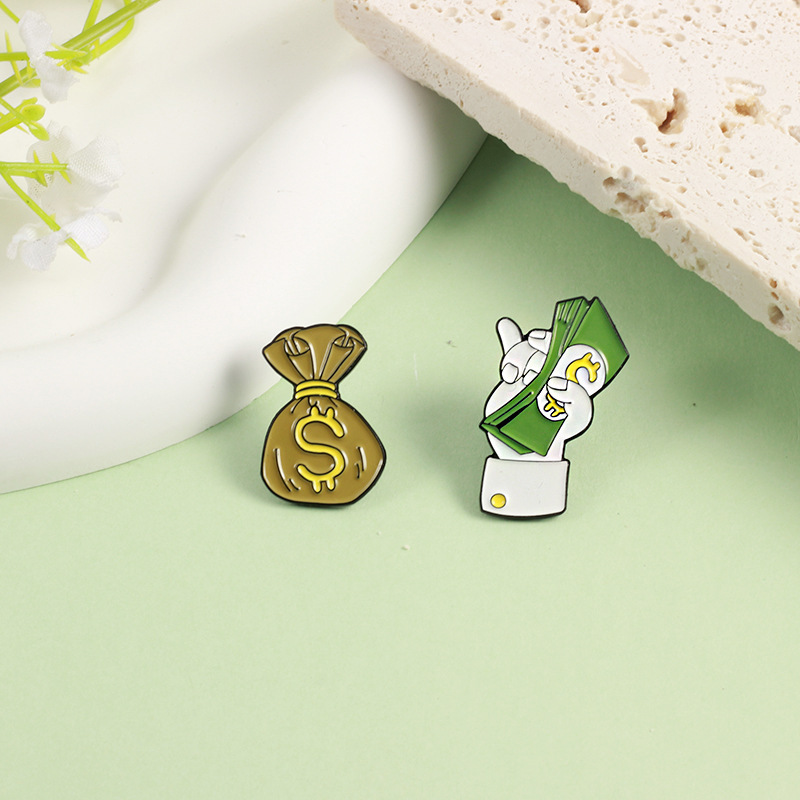 Picture of Put dollars into the bag cartoon fashion badge Flying Dollar full bag dollar creative design brooch