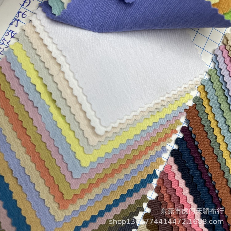 Spot supply woven wash water wrinkle woven polyester wrinkle cloth plain wrinkle cloth fashion women's shoes and hats material