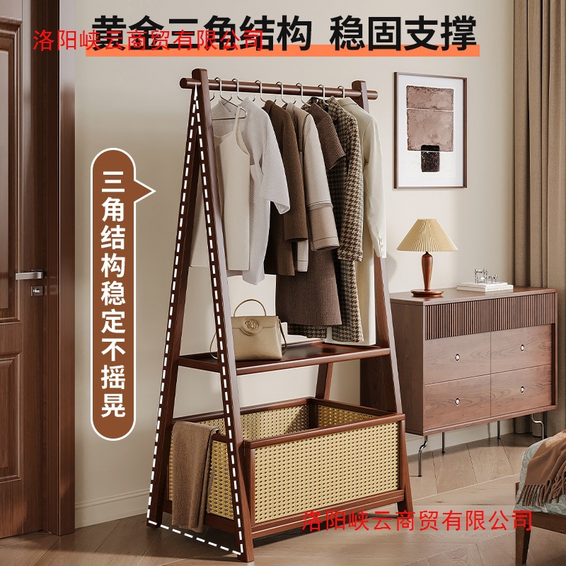 Picture of Vertical hanger floor simple coat rack rack for hanging clothes in a home room is foldable and durable drying rack