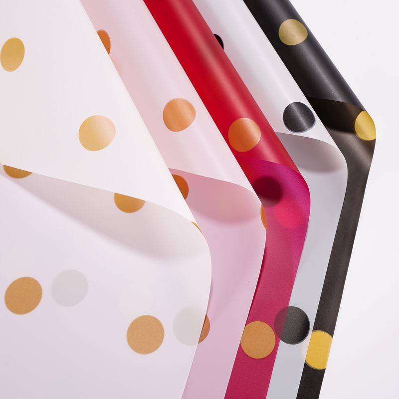 Caramel wave dot waterproof film wholesale fresh bouquet wrapping paper semi-transparent Han su wrap paper flower shop floral materials