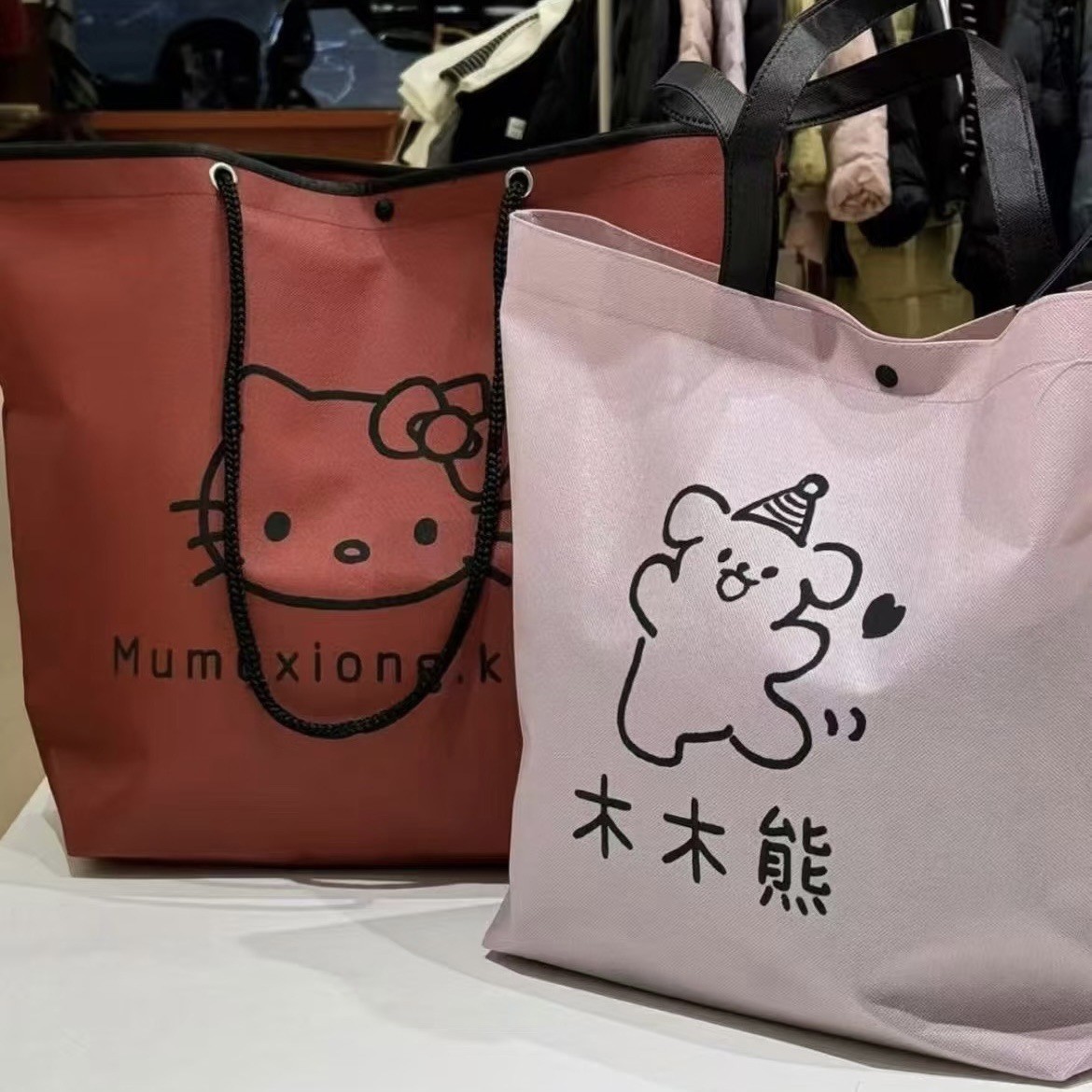 Non-woven bag custom environmental protection clothing store bag women's clothing children's clothing store shopping drawstring packaging bag high sense